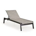 Front view of outdoor aluminum and sling chaise lounge and a half in dark color frame and neutral sling