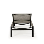 Back view of outdoor aluminum and sling chaise lounge and a half in dark color frame and neutral sling