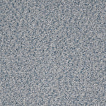 textured upholstered fabric in dark, medium and light blue
