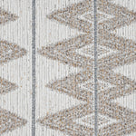 jacquard weave boasts a series of bold, interconnected diamonds in brown on neutral background
