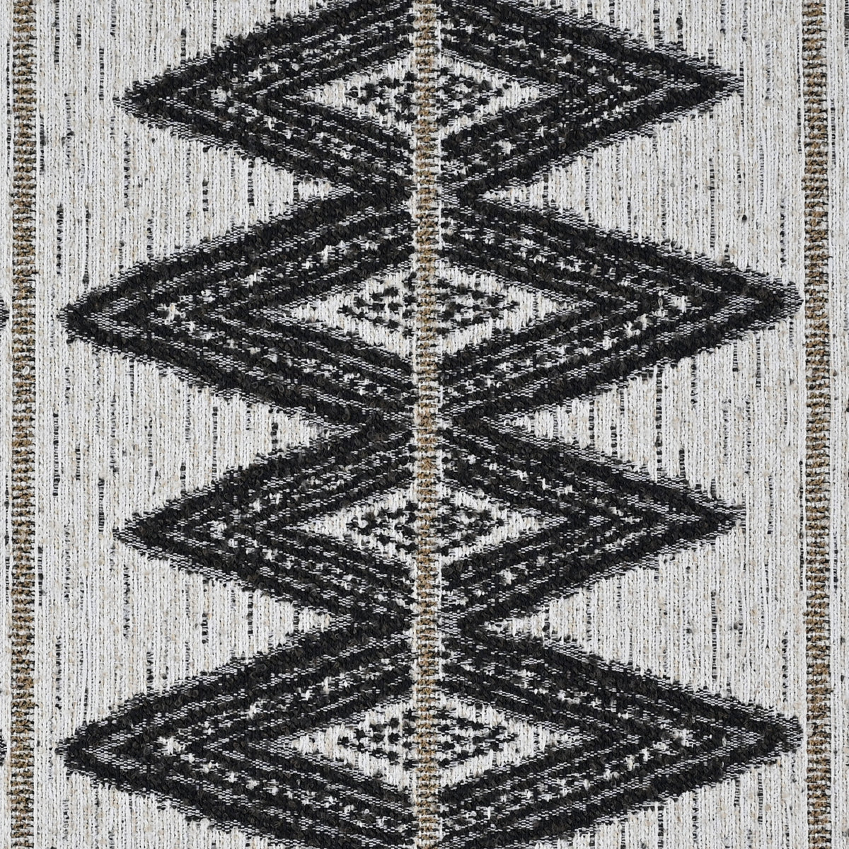 jacquard weave boasts a series of bold, interconnected diamonds in dark charcoal on neutral background
