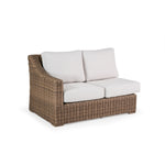 Outdoor Woven Left Facing Arm Loveseat with two seat cushions and two back cushions.