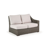 Outdoor Woven Right Facing Arm Loveseat with two seat cushions and two back cushions.
