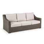 Outdoor Woven Sofa with three seat cushions and three back cushions.